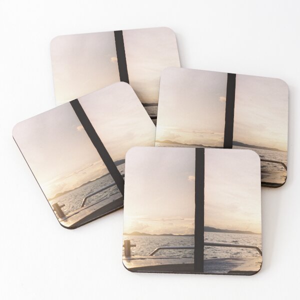 Item preview, Film photography half frame. Sea view film photography at sunset the orange light of the sky and the clouds at the sea. Sitting on a boat in the middle of the sea watching the sunset. designed and sold by DecorForYou.
