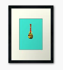 Toy guitar Framed Print