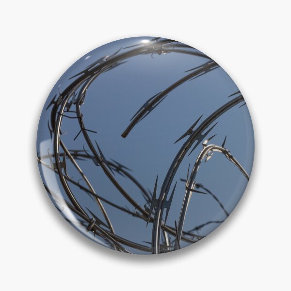 Item preview, Razor wire silhouette against sky no.1 designed and sold by Kendall Anderson.