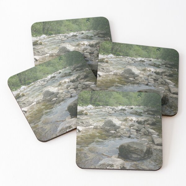 Item preview, A static shot of the clear water of a mountain stream between rocks and stones; beautiful nature in a sunny day; no people around designed and sold by Maurizio Fabbroni.