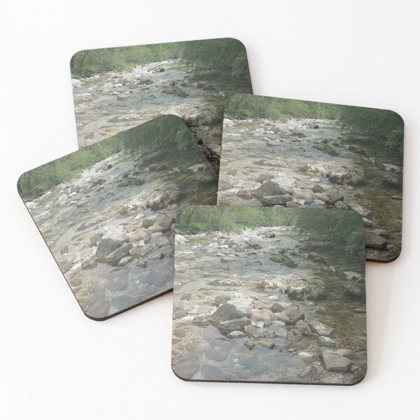 Item preview, A static shot of the clear water of a mountain stream between rocks and stones; beautiful nature in a sunny day; no people around designed and sold by Maurizio Fabbroni.