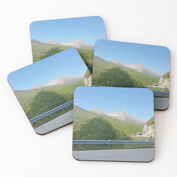 Item preview, A static shot from the panoramic point Castaldia di Piancavallo; road to the tunnel inside the hill. Beautiful nature in a spring sunny day; no people around designed and sold by Maurizio Fabbroni.