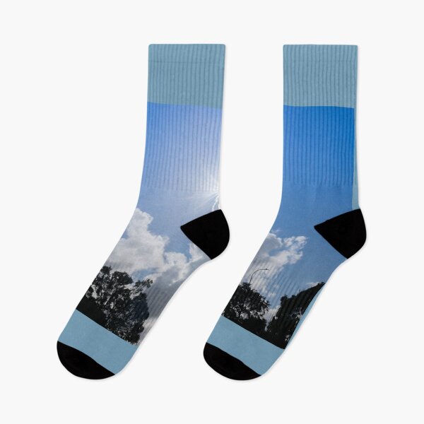 Item preview, Sun bursts above cloud against blue sky. designed and sold by Brian Scantlebury.
