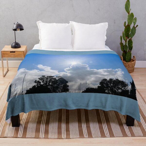 Item preview, Sun bursts above cloud against blue sky. designed and sold by Brian Scantlebury.
