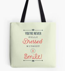 You're Never Fully Dressed Without a Smile - Be Inspired T shirt Tote Bag