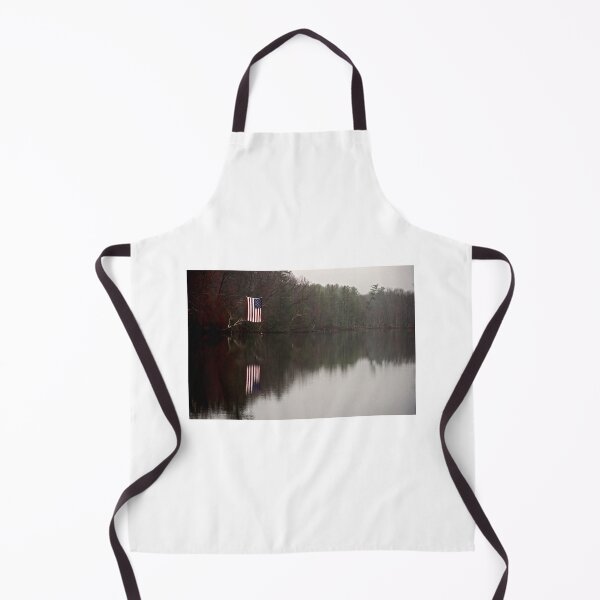 Item preview, An American Flag Hangs Over the Still Waters of Nashawannuck Pond In Late Autumn designed and sold by Stephen Orsillo.