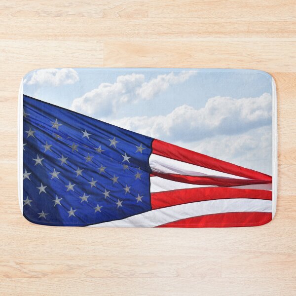 Item preview, Bright American Flag Under a Blue Cloudy Sky designed and sold by SEEphotos7171.