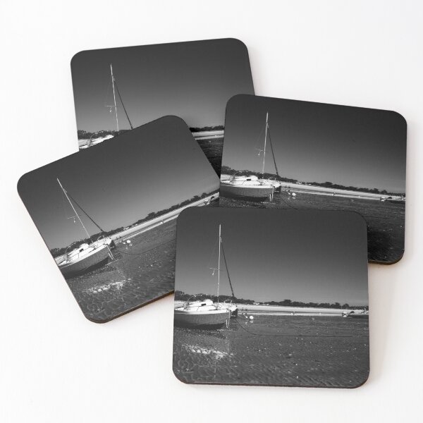 Item preview, boats laying on the beach in black white designed and sold by FotoMahieu.