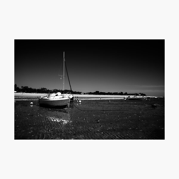 Item preview, boats laying on the beach in black white designed and sold by FotoMahieu.
