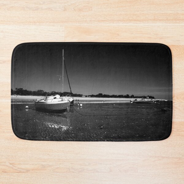 Item preview, boats laying on the beach in black white designed and sold by FotoMahieu.