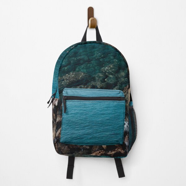 Item preview, Blue sea water, rocks, people snorkeling designed and sold by AgaRadDesigns.