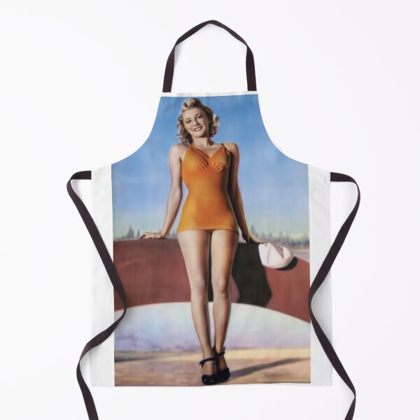 Item preview, 1940s pinup in an orange swimsuit, blue sky and tiny skyline designed and sold by Lowtech.