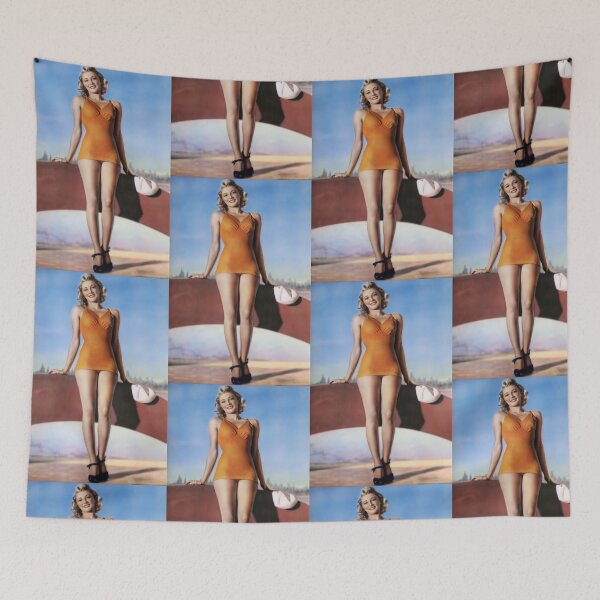 Item preview, 1940s pinup in an orange swimsuit, blue sky and tiny skyline designed and sold by Lowtech.