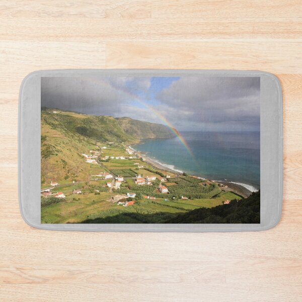 Item preview, Amazing rainbow over Santa Maria island, landscape with a nice bay and beach, small village, Azores travel destination. designed and sold by AylaHarbich.