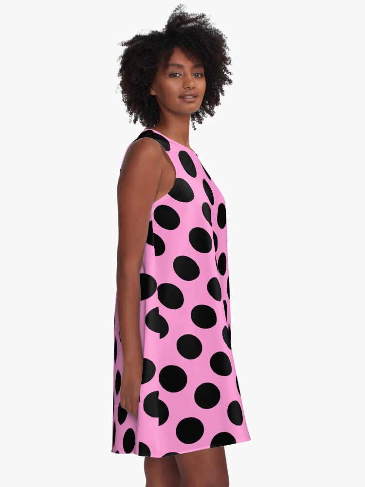 Yellow dress store with black spots