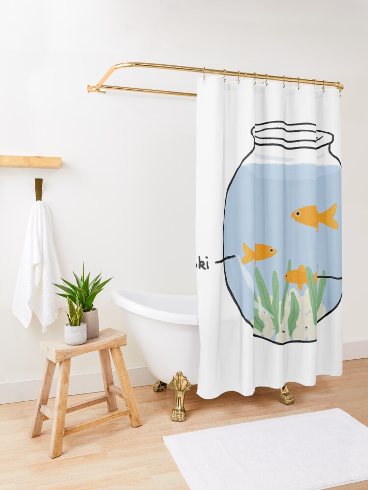 Curtain in small bathroom with a theme of fish. Fish net with