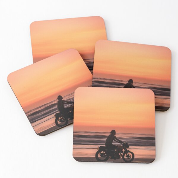 Item preview, Man Riding Bike on Beach during Sunset Classic T-Shirt designed and sold by pondemand.