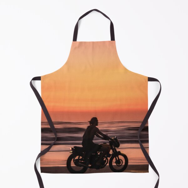 Item preview, Man Riding Bike on Beach during Sunset Classic T-Shirt designed and sold by pondemand.