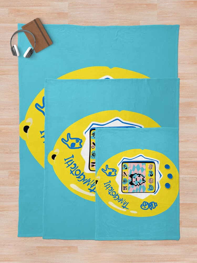 Manta for Sale con la obra «Tamagotchi original - amarillo con azul» de  Nossikko