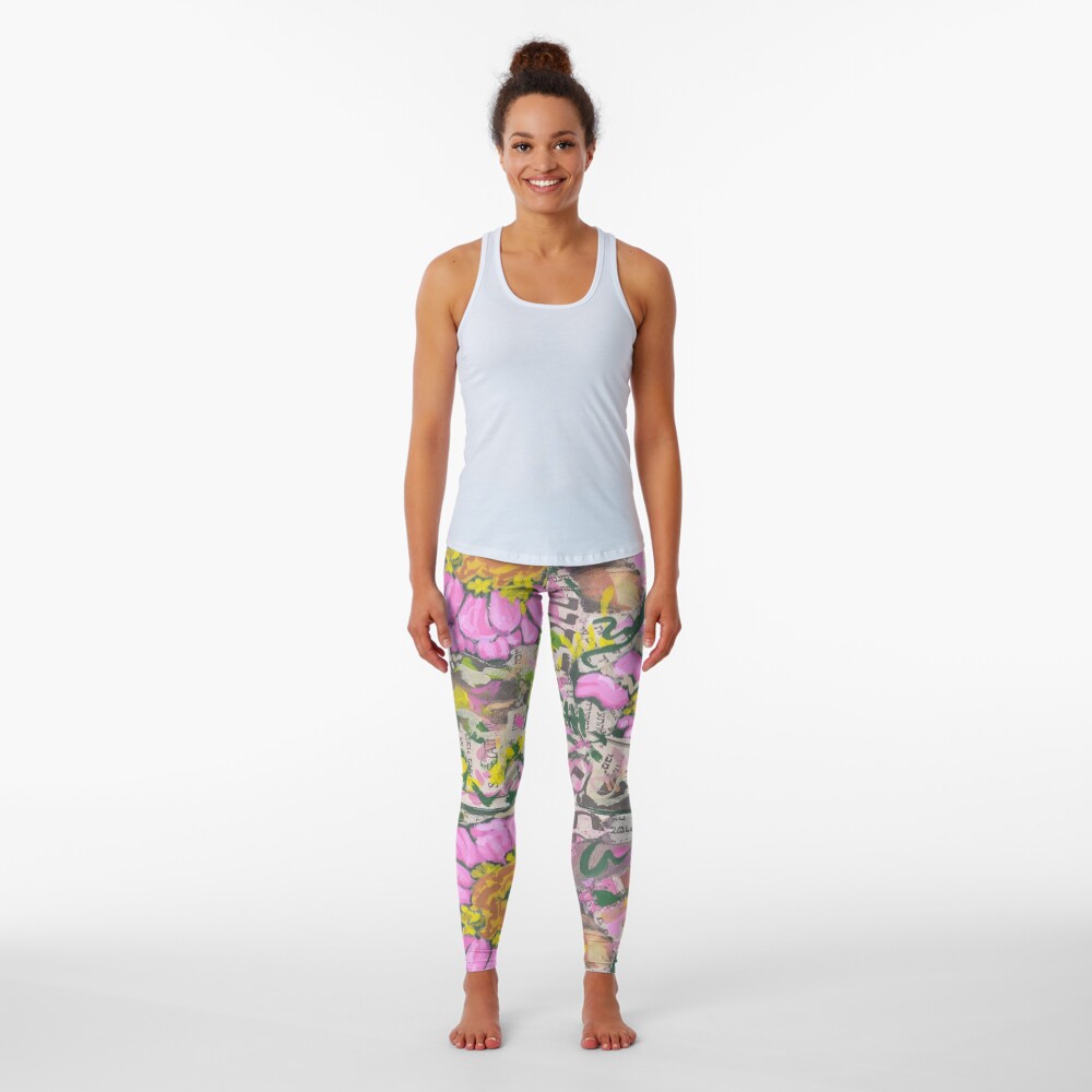 Two pink flowers on a graffiti wall Leggings
