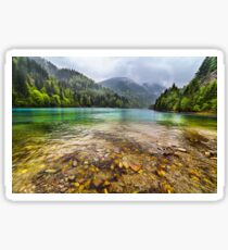 Lake in mountains, in a rainy day Sticker
