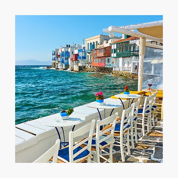 Wall Mural greek outdoor restaurant with Mediterranean sea view