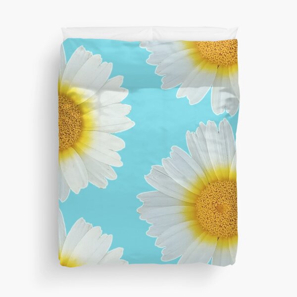 A Daisy Flower in a Turquoise Blue Background Duvet Cover