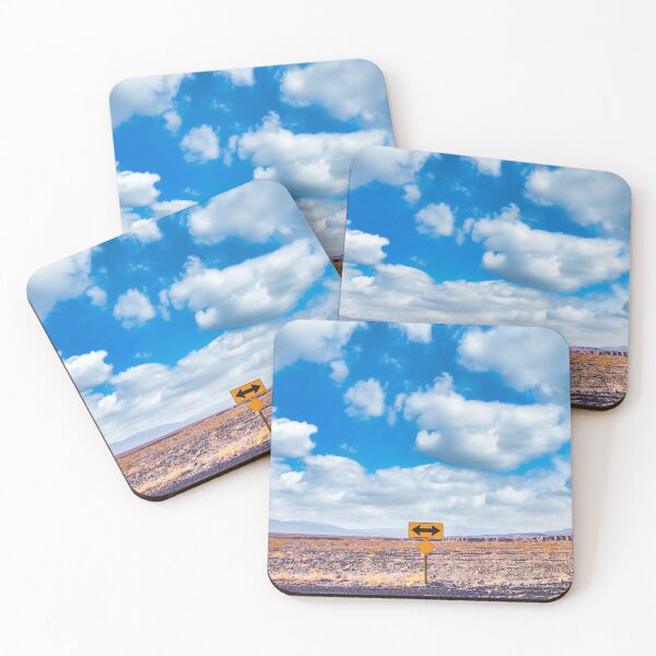 Item preview, Directional sign in the desert with scenic blue sky and wide horizon. Concept for trip, freedom and transportation.  designed and sold by Paolo Modena Photography    -   Fine Italian Art.