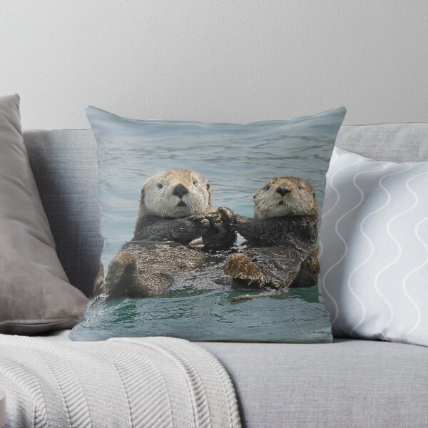 Sea Otters Throw Pillow