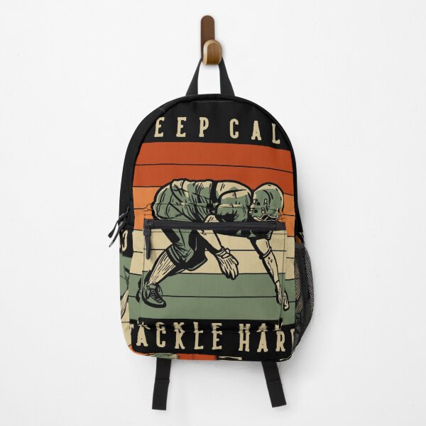 Item preview, T-shirt Design with Keep Calm Tackle Hard Football Player Doing Tackle Position Vintage Illustration designed and sold by Peekonet.