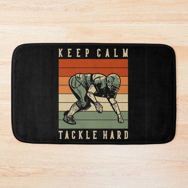 Item preview, T-shirt Design with Keep Calm Tackle Hard Football Player Doing Tackle Position Vintage Illustration designed and sold by Peekonet.