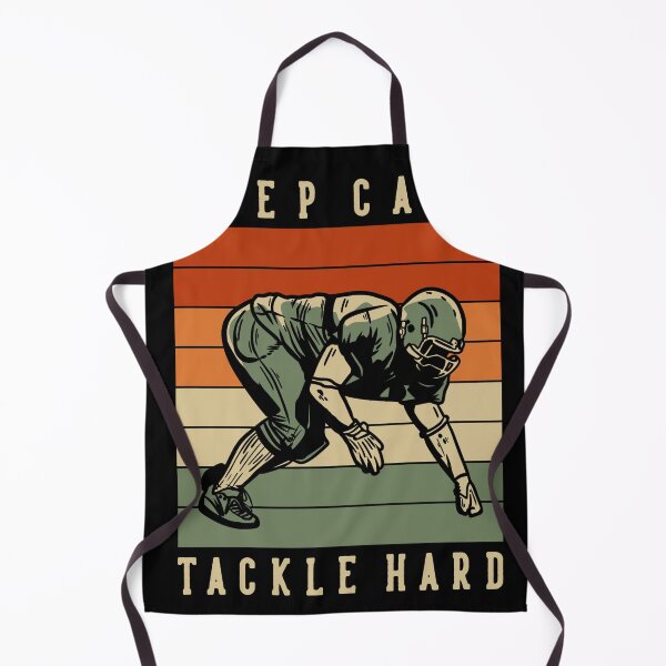 Item preview, T-shirt Design with Keep Calm Tackle Hard Football Player Doing Tackle Position Vintage Illustration designed and sold by Peekonet.