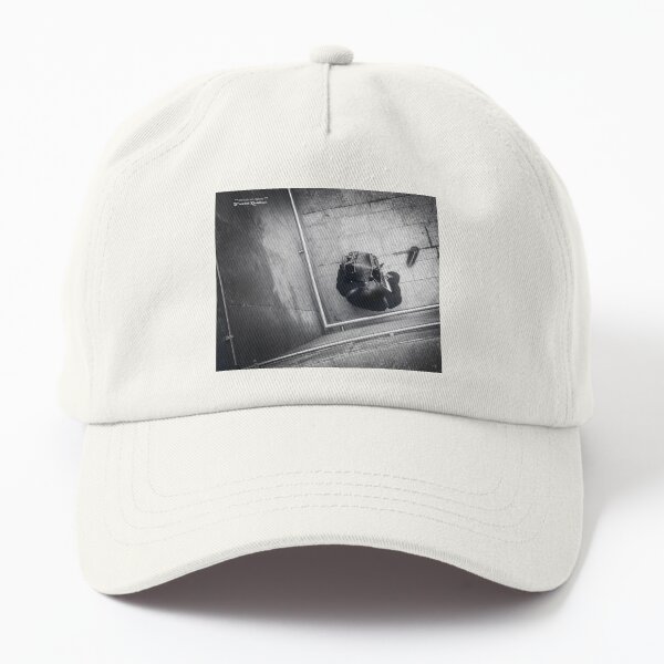 Misery of a vagabond musician (Mobile phone capture) Dad Hat