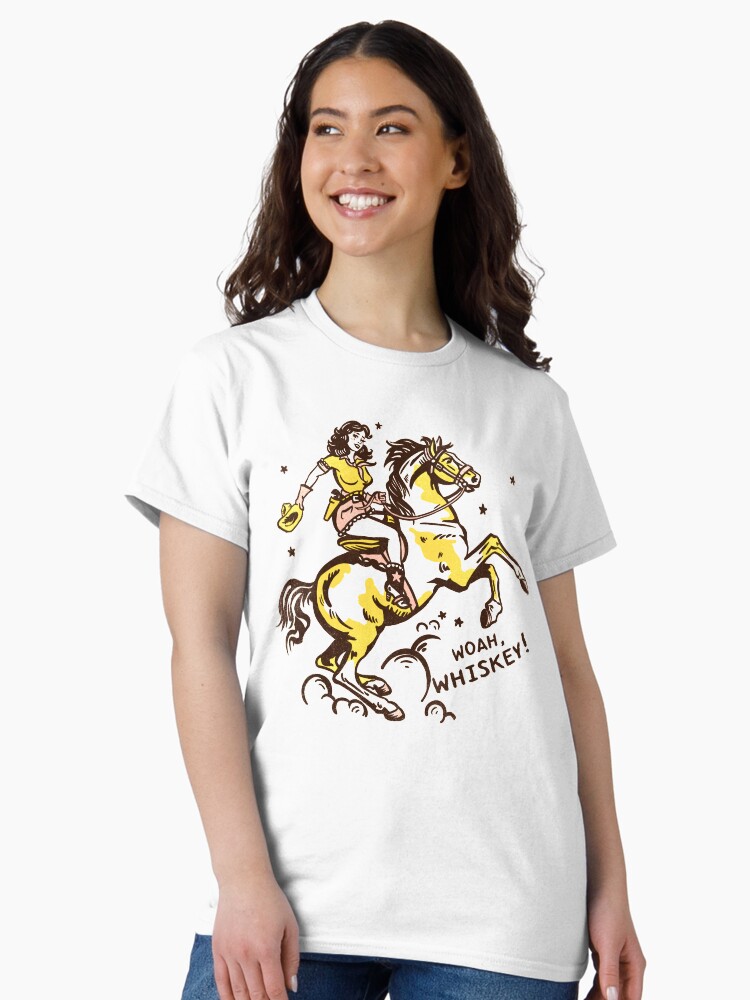 Thumbnail 1 of 7, Classic T-Shirt, "Whoa Whiskey" Retro Pin Up Cowgirl Riding Her Horse designed and sold by gramse212.