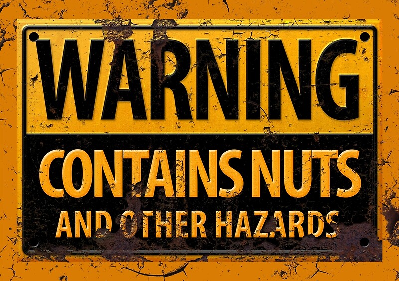 "Danger Contains Nuts & Other Hazards Sign" Framed Prints by
