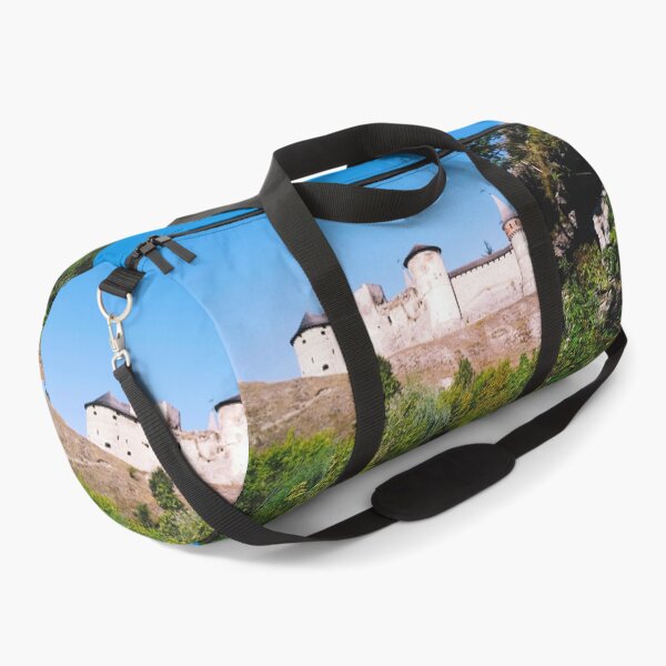 Item preview, The Old Fortress against the background of the blue cloudless sky, Kamenets-Podolsky, Ukraine designed and sold by helenkaiy.