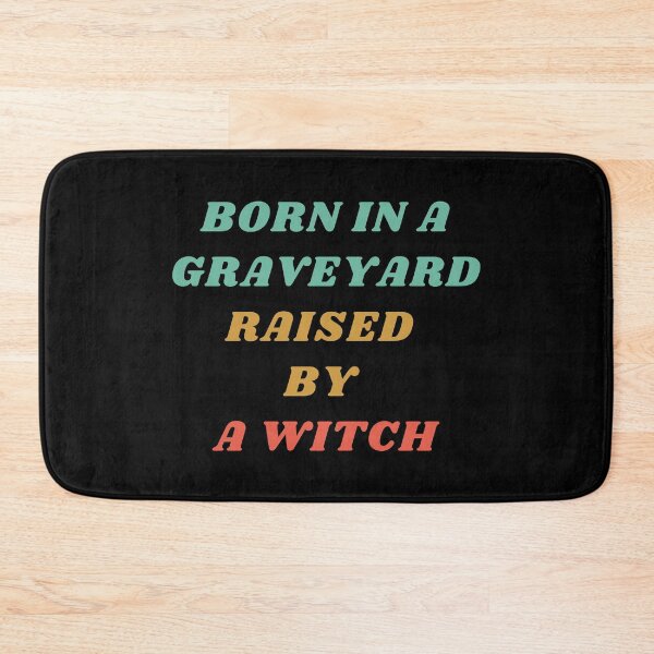 Item preview, Born In A Graveyard Raised By A Witch Funny Halloween designed and sold by mirzadesign.