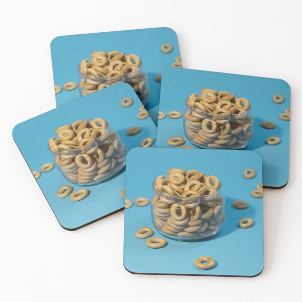 Item preview, Yellow small sushki bagels in glassware on a blue background. Bagels are scattered around designed and sold by Tae Mi.
