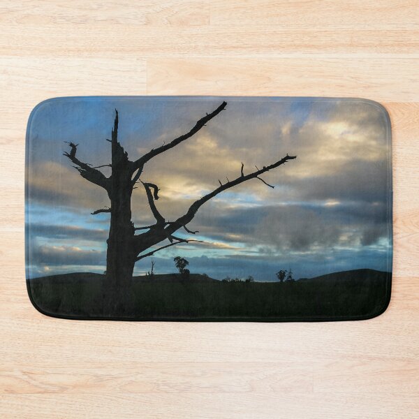 Item preview, Silhouetted tree skeleton against a dramatic sky designed and sold by James-Cole.