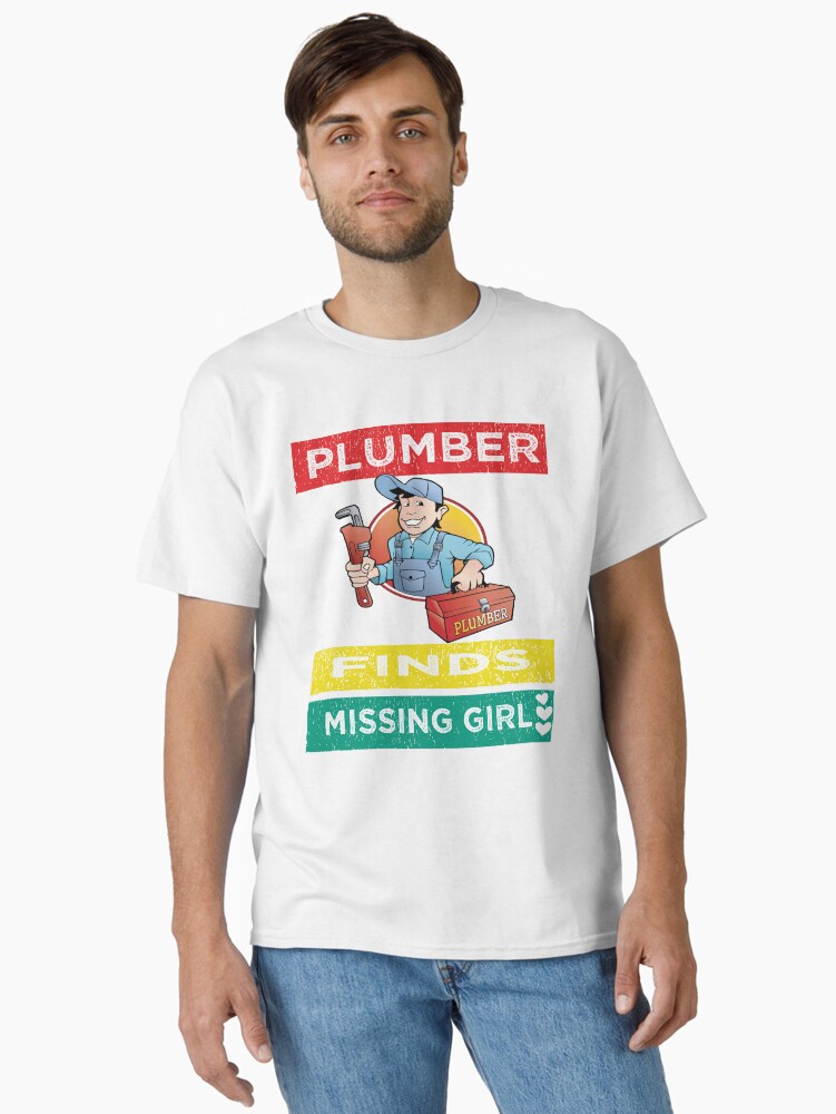 Thumbnail 1 of 7, Classic T-Shirt, plumber finds missing girl designed and sold by amirboudour2402.