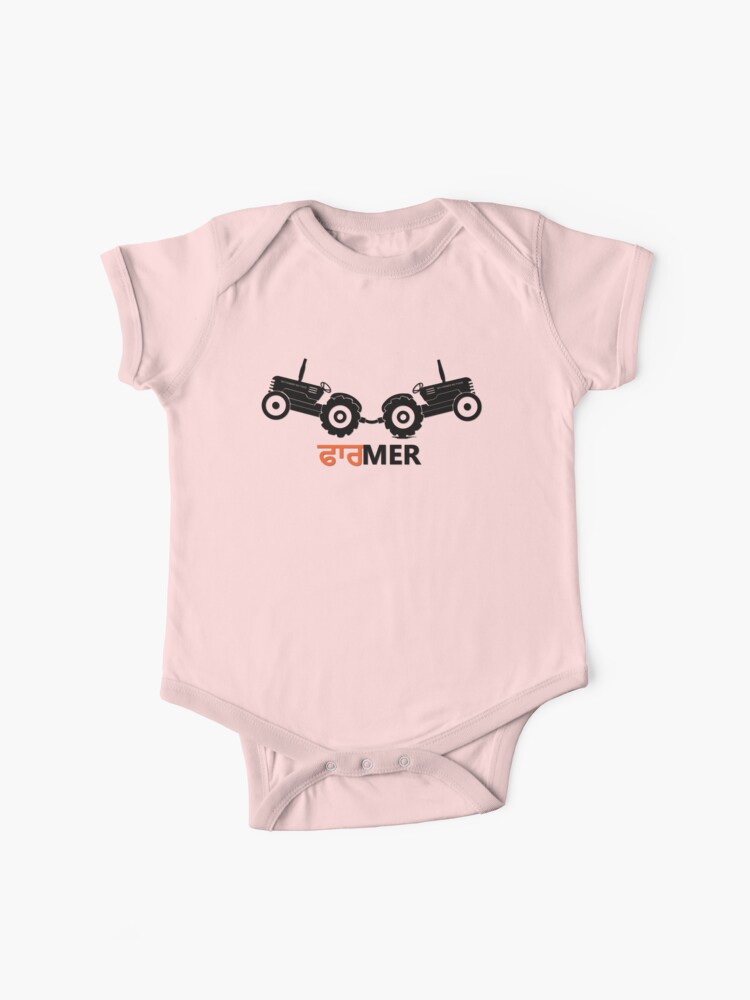 Baby fashion clothes with tractors on them