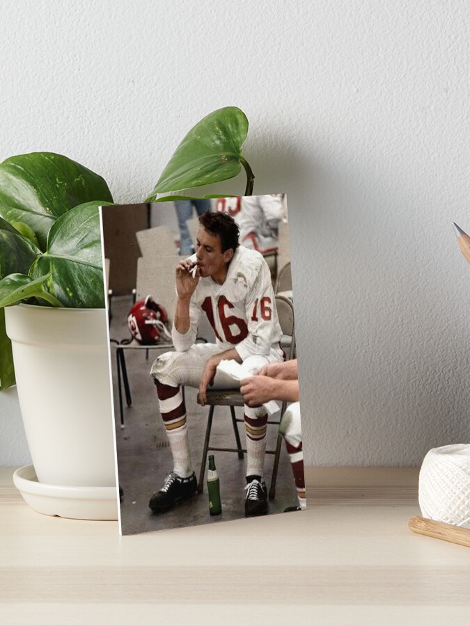 Len Dawson smoking during Super Bowl I is an all-time great sports photo 