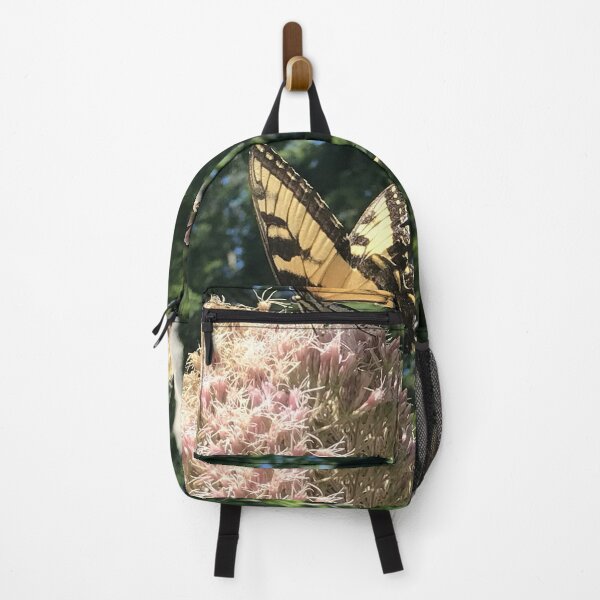 Item preview, Butterfly on flower with blurred forest background designed and sold by Rachel the Artist .