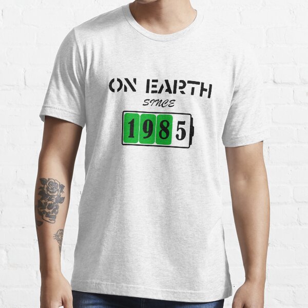 On Earth Since 1985 Essential T-Shirt