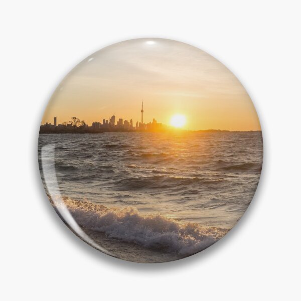 Item preview, Breaking Wave Sunrise - Toronto Skyline Behind Rough Lake Ontario designed and sold by Georgia Mizuleva.