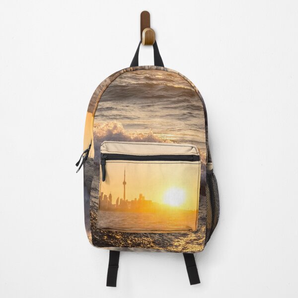 Item preview, Breaking Wave Sunrise - Toronto Skyline Behind Rough Lake Ontario designed and sold by Georgia Mizuleva.