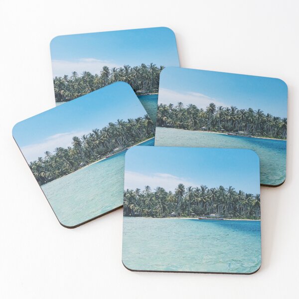Item preview, Distant view of a boat moored at an island covered with tropical trees. designed and sold by Priya Mishra.