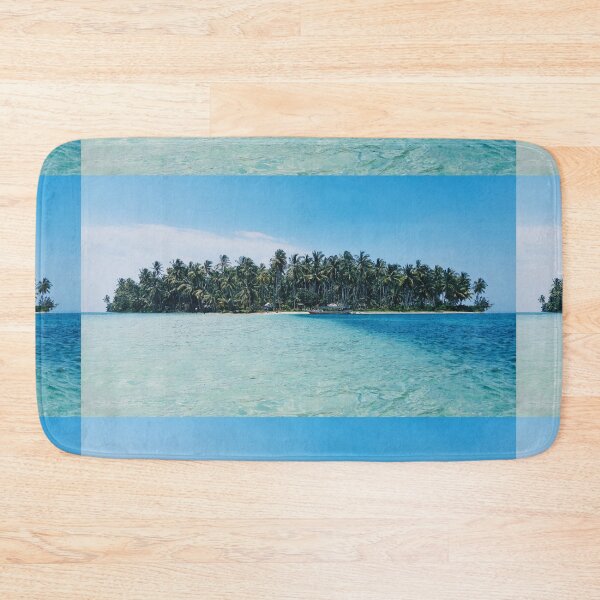 Item preview, Distant view of a boat moored at an island covered with tropical trees. designed and sold by Priya Mishra.
