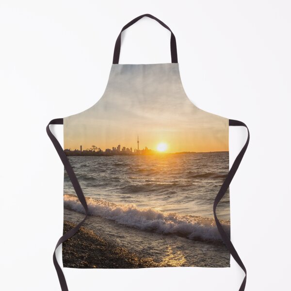 Item preview, Breaking Wave Sunrise - Toronto Skyline Behind Rough Lake Ontario designed and sold by Georgia Mizuleva.