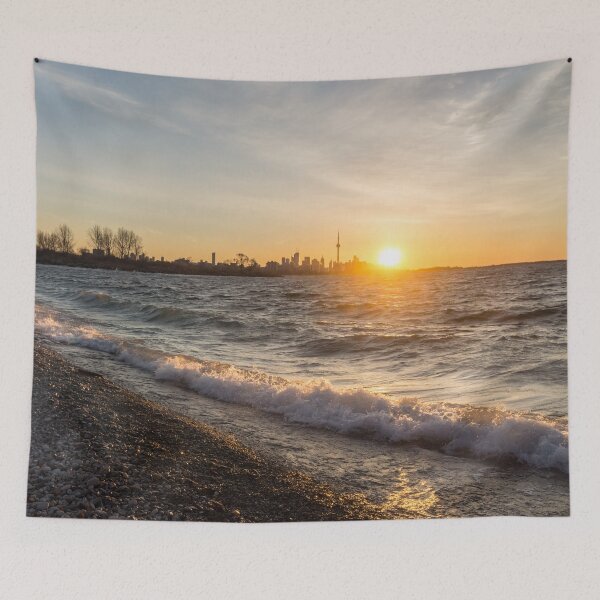 Item preview, Breaking Wave Sunrise - Toronto Skyline Behind Rough Lake Ontario designed and sold by Georgia Mizuleva.
